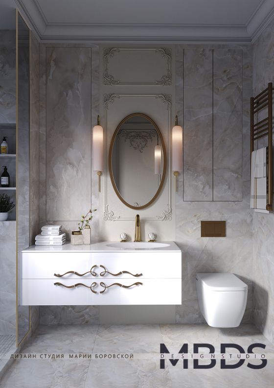 Jörger Design Belledor washbasin tap in sunshine matt with handles made of white, gold-painted porcelain in an Art Deco bathroom interior.